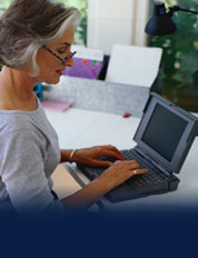 Woman with laptop.